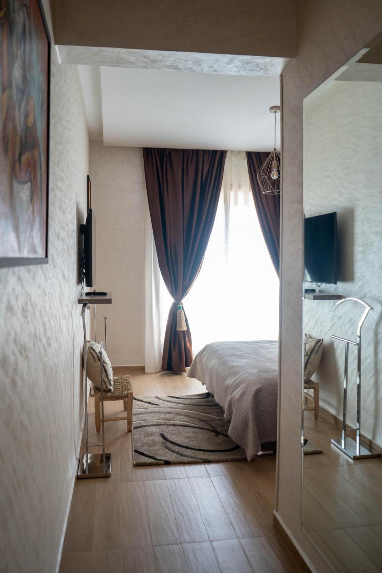 Magnifique Appartement Moderne De 2 Chambres Avec Piscine A 10 Min Du Centre De Marrakech มาร์ราเกช ภายนอก รูปภาพ